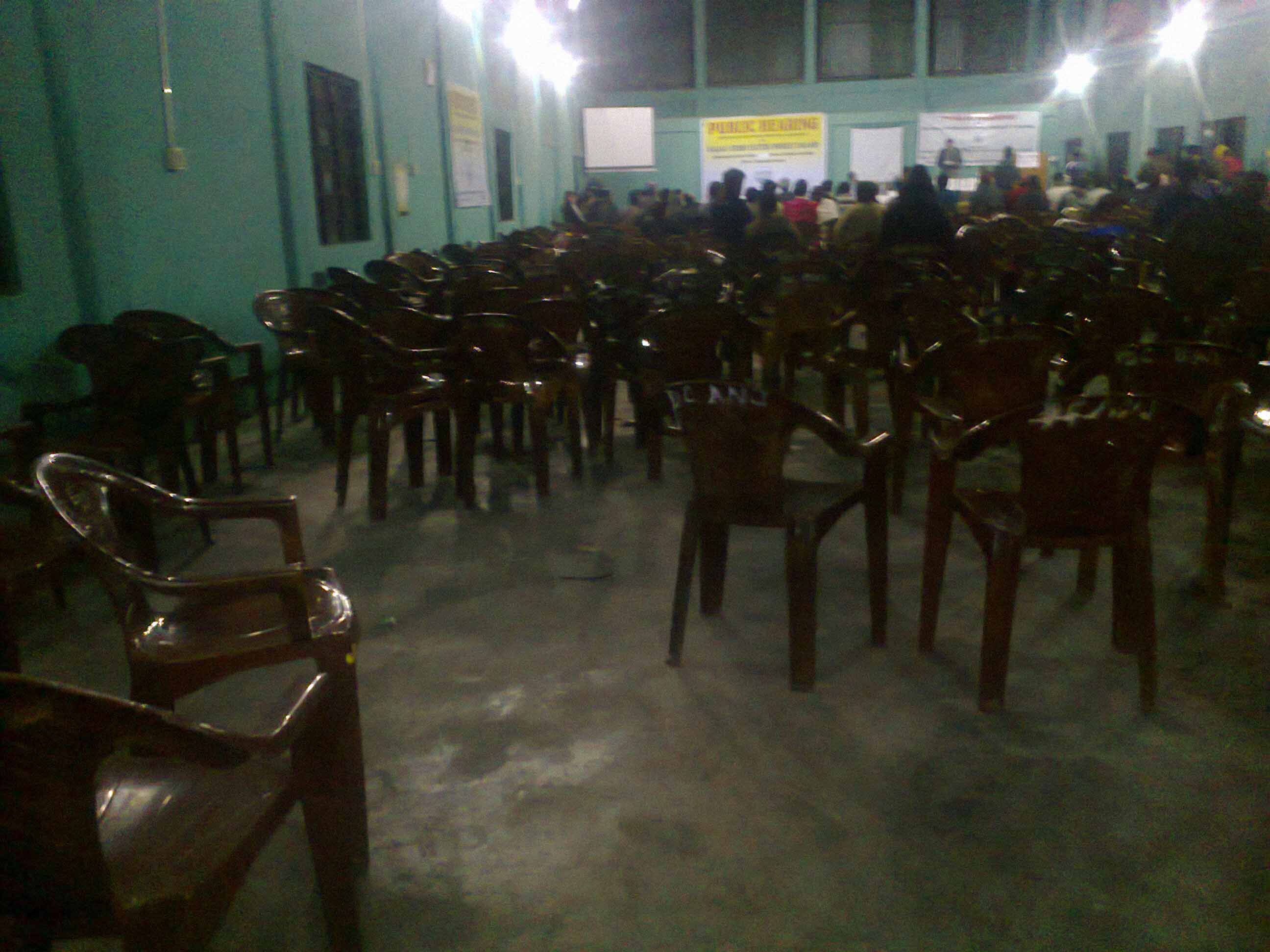 A public hearing without public: Chairs remain vacant at the Kalai II public hearing venue