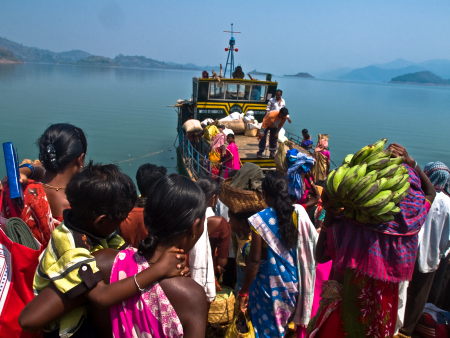 tribals trying to get aboard the only motor launch thats their link to the main land after being cut off by Machkund and Balimela Dams. Photo from : http://moonchasing.wordpress.com/2010/03/14/forgotten-country-the-cut-off-area-of-malkangiri/