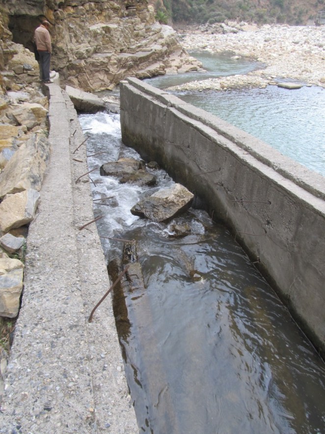 Fishladder can be seen in serious state of disrepair and blocked by broken concrete parts can be seen here