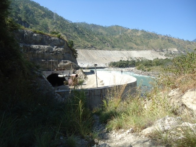 Under Construction Tail Race Channel of Punatsangchu II HEP, in the upstream one can see muck entering the river from construction sites, one can see this all along the river