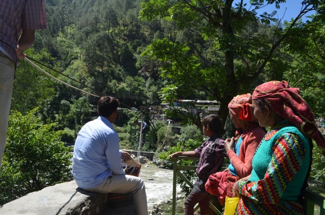 Villagers waiting for ropeway trolley where a foot bridge at middle Kharadi washed away in June 2013