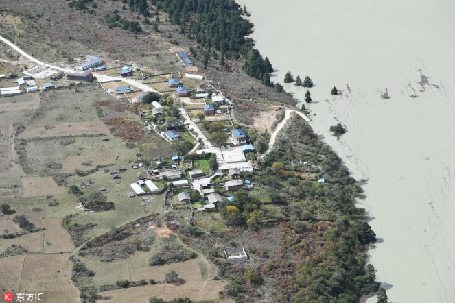 The barrier lake formed by a landslide in the Yarlung Zangbo River in Southwest China's Tibet autonomous region on Oct 18. [Photo:IC]3
