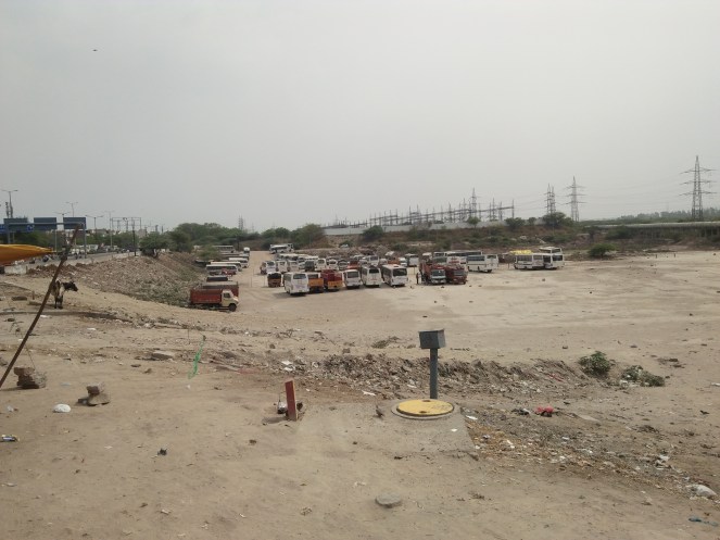 Parking facility in Yamuna floodplain at Garhi Mandu.