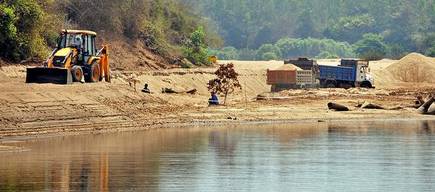 Sand mining at Extraction of sand on Tunga river near Chibbalagudde fish sanctuary